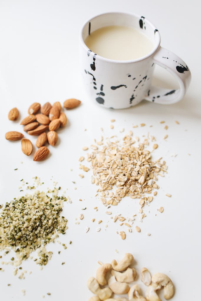 Photo Of Assorted Nuts Near Mug
